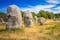 photo of The Carnac stones are an exceptionally dense collection of megalithic sites in Le Ménec, France.