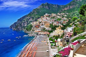 Photo of aerial morning view of Amalfi cityscape on coast line of Mediterranean sea, Italy.