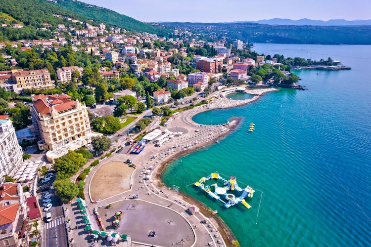 Photo of town of Opatija and Slatina beach aerial panoramic view, Kvarner bay of Croatia.