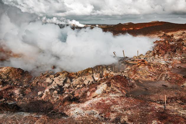 photo of Gunnuhver, a colourful geothermal field of various mud pools and fumaroles in the southwest part of the Reykjanes Peninsula in Iceland .