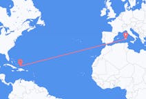 Flyreiser fra Sør-Caicos, Turks- og Caicosøyene til Cagliari, Italia