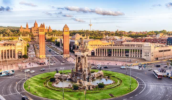 Photo of aerial view of Placa d'Espanya, towards the Venetian Towers and the National Art Museum. This iconic square is located at the foot of Montjuic and it's a major landmark in Barcelona, Catalonia, Spain.