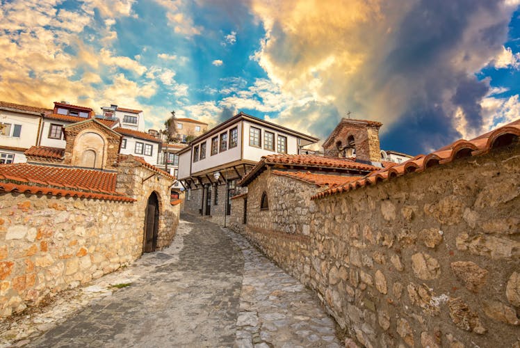 Photo of Narrow street in the old town of Ohrid on a beautiful sunset.