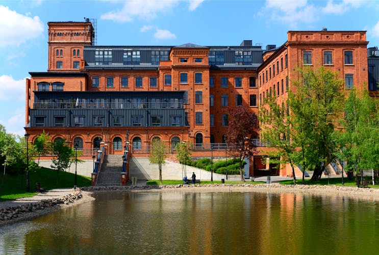Photo of Lodz city in central Poland know for textile manufacturing, historic textile factory transformed into residential apartments buildings.