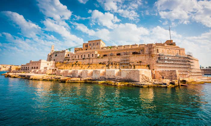 Photo of aerial view of Fort Saint Angelo of Birgu in Malta from the sea.