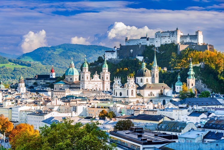 Photo of beautiful view of Salzburg skyline with Festung Hohensalzburg in autumn.