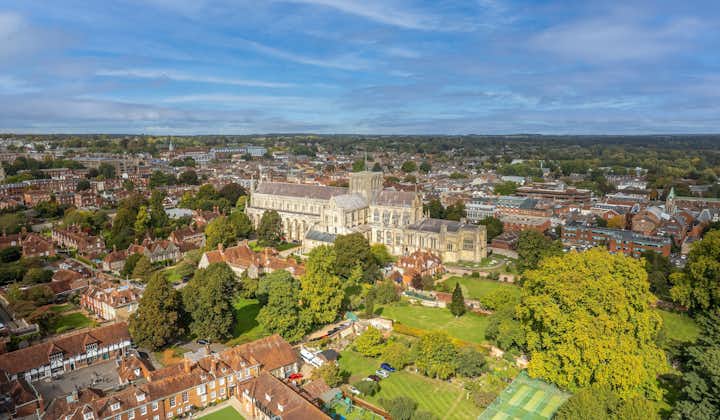 Photo of aerial view of Winchester Cathedral and city, England.