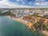 Photo of aerial amazing view of town Olhos de Agua, Algarve Portugal.