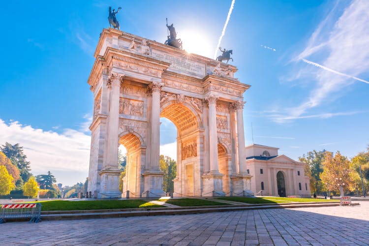 Photo of Arch of Peace, or Arco della Pace, city gate in the centre of the Old Town of Milan in the sunny day, Lombardia, Italy.