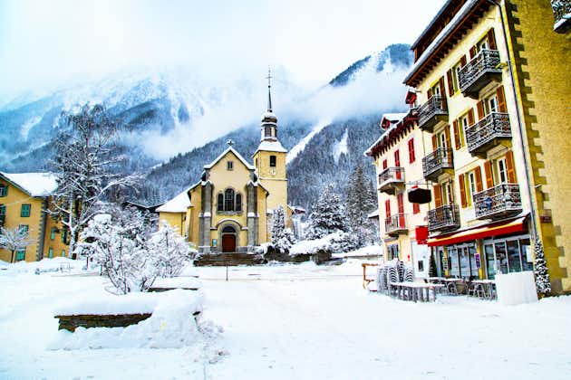Church in Chamonix, France, French Alps in winter, street view and snow mountains.
