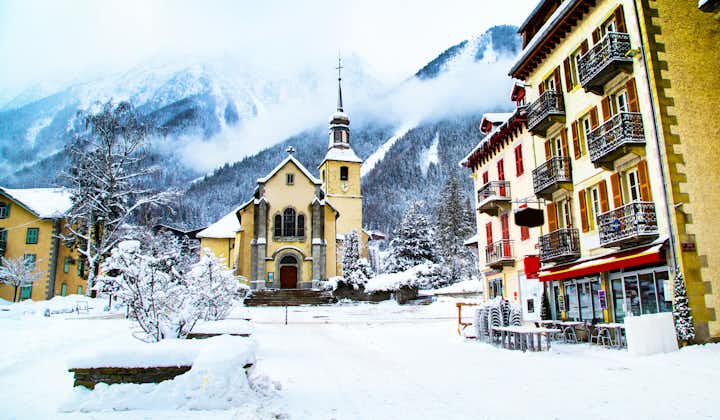 Church in Chamonix, France, French Alps in winter, street view and snow mountains.