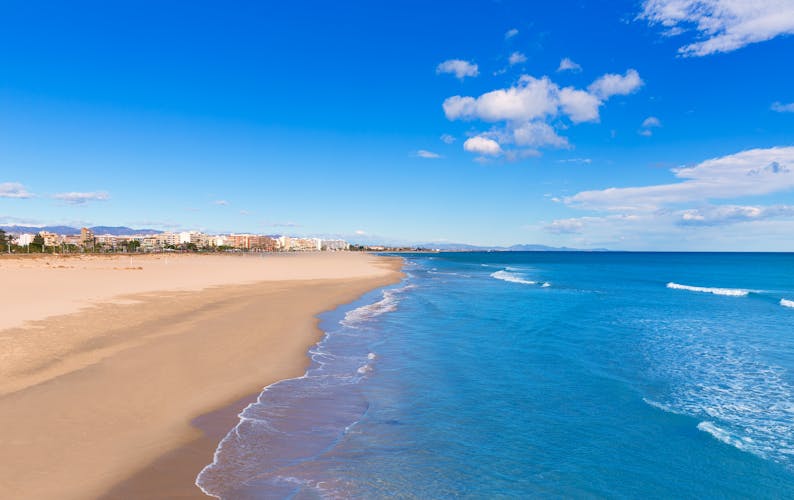 Photo of Sagunto beautiful beach in Valencia on a sunny day in Mediterranean Spain.
