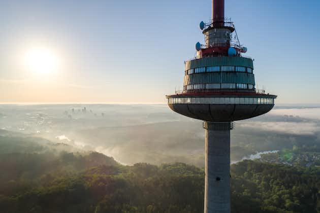 photo of close up view of tv tower -highest building in vilnius city in early morning with fog.