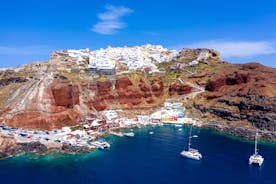 Photo of beautiful White architecture of Oia village on Santorini island, Greece.
