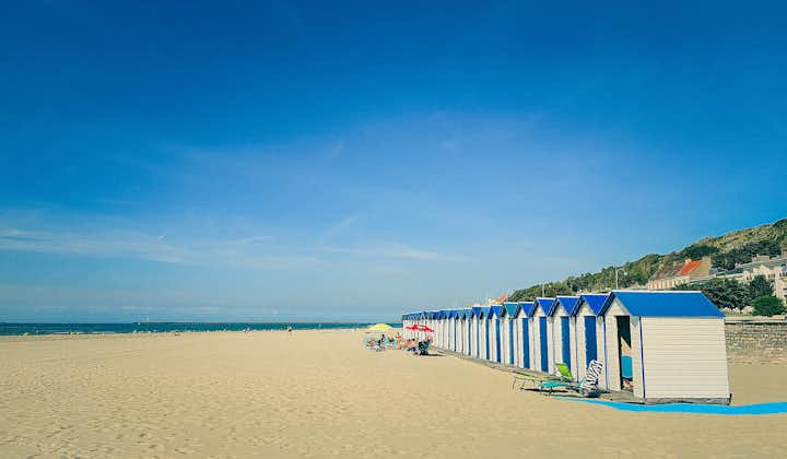 Row of white and blue beach huts at Boulogne-sur-Mer, Pas-de-Calais, France