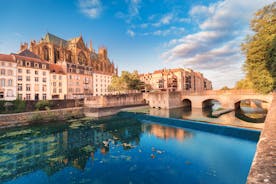 Photo of Metz city view of Petit Saulcy an Temple Neuf and Moselle River in Summer, France.