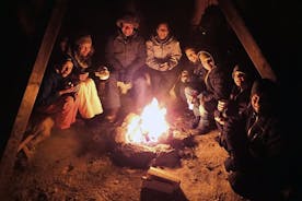 Snowshoe trip with a campfire in Tromso