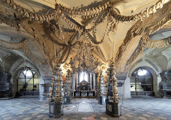 Photo of Interior of the Sedlec ossuary (Kostnice) decorated with skulls and bones, Kutna Hora, Czech Republic.