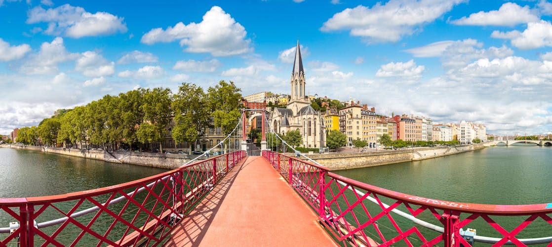 Photo of Pedestrian Saint Georges footbridge and the Saint Georges church in Lyon.