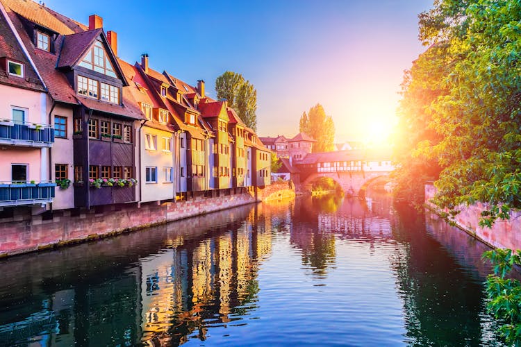 Photo of Scenic summer sunset view of the bridge over Pegnitz River in the Old Town architecture of Nurnberg,.