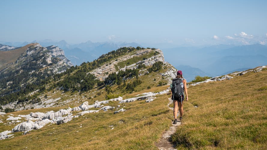 Photo of woman hiking the Chartreuse moutains, in the French Alps, near the Dent de Crolles, Grenoble.