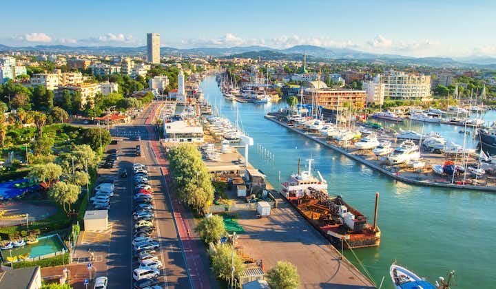 Photo of Aerial view on Rimini. Italian cityscape from above. Lighthouse on water sea canal. Rimini city. Summer vacation.