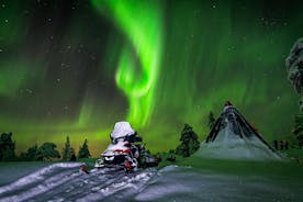 Jakt Northern Lights av snøscootere