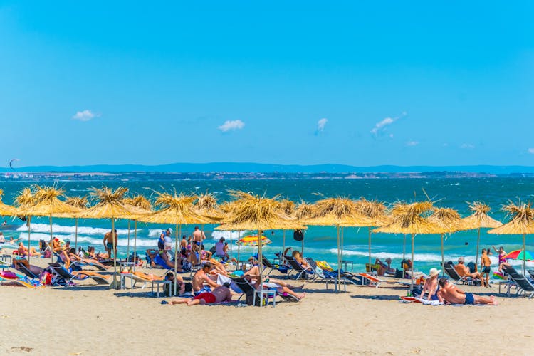 Photo of people enjoying sunny day on a beach in the Bulgarian city Burgas.