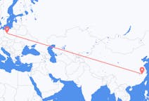 Flyg från Huangshan, Kina till Poznan, Polen