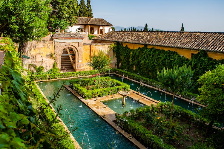 Photo of Generalife gardens with fountains in Alhambra,Granada,Spain.