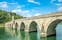 Photo of the Mehmed Pasa Sokolovic Bridge over the Drina River in Visegrad, Bosnia and Herzegovina.