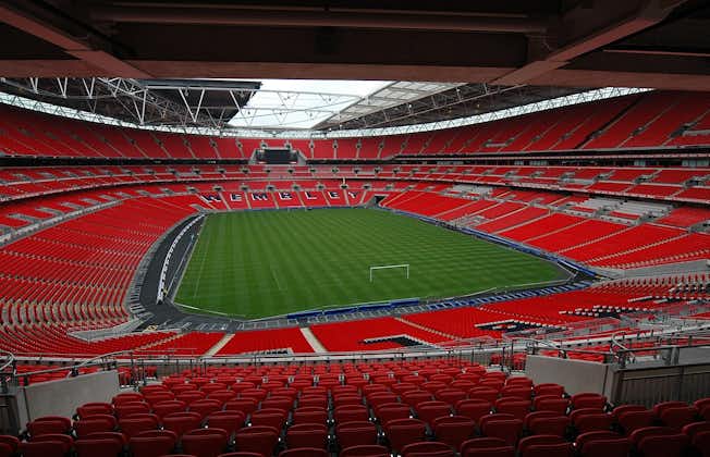 Photo of interior of Wembley Stadium that is a football stadium in Wembley, UK.