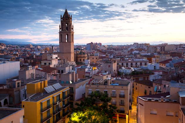Panoramic city view with cathedral Prioral de Sant Pere in evening in Reus, Spain