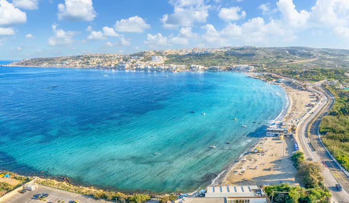 Photo of landscape with Mellieha Bay beautiful beach on a sunny day, Malta.