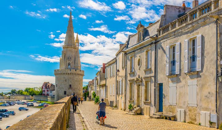Photo of seaside of La Rochelle dominated by Tour de la Lanterne, France.