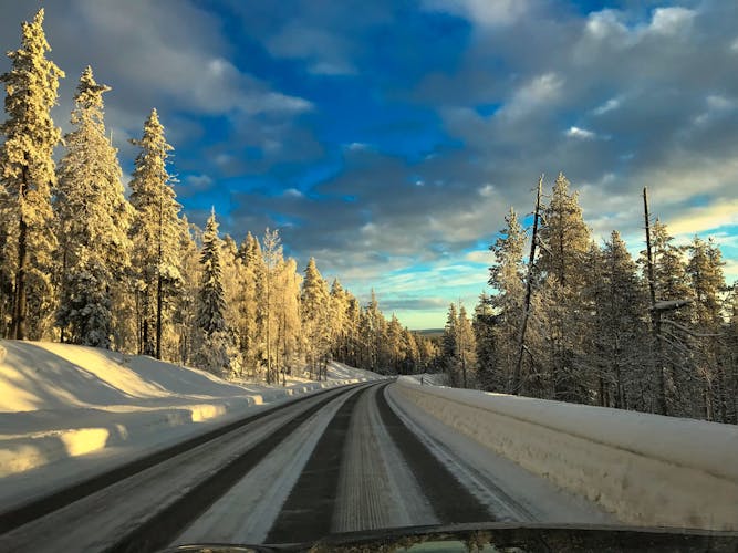 Photo of beautiful road in finish Lapland during sunrise, Kolari.