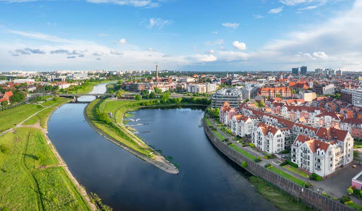 Photo of Poznan, Poland. Aerial view of Warta river and residential buildings in the district of Old Port.