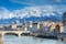Photo of morning cityscape view with mountains, river and bridge in Grenoble city on the south-east of France.