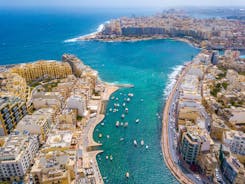 Photo of beautiful aerial view of the Spinola Bay, St. Julians and Sliema town on Malta.