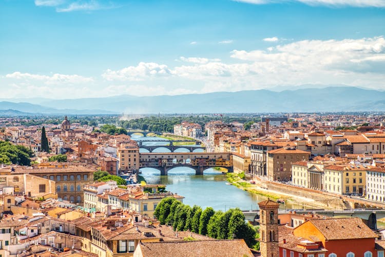 Photo of Florence Aerial View of Ponte Vecchio Bridge during Beautiful Sunny Day, Italy.