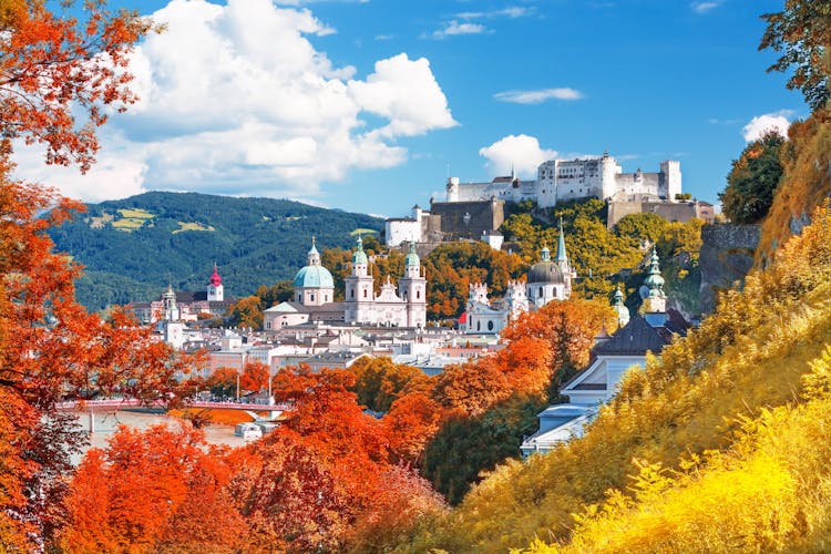 Photo of beautiful scenic view on Salzburg skyline with Festung Hohensalzburg in the summer.