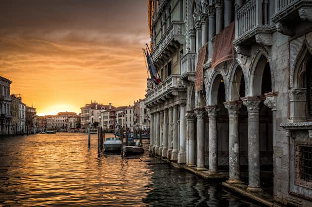 photo of Ca' d'Oro palace or Palazzo Santa Sofia (Golden House) at sunset, Venice, Italy. It is one of landmarks of Venice. Nice view of Grand Canal at dusk. Beautiful cityscape of old Venice in evening.