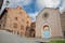 Lucignano, Arezzo, Tuscany, Italy: the medieval church of San Francesco and the ancient town hall Palazzo Pretorio in the center of the picturesque Tuscan town.