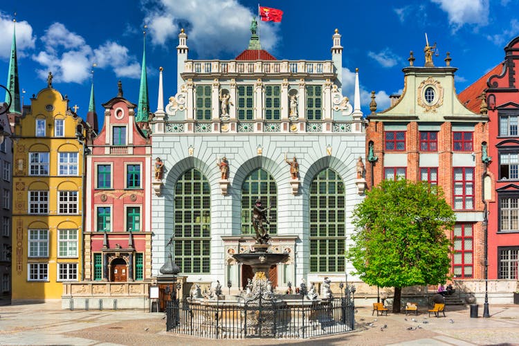 Photo of beautiful architecture of the old town in Gdansk with Artus court.