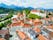Photo of aerial panoramic view of Hohes Schloss Fussen or Gothic High Castle of the Bishops and St. Mang Abbey monastery in Fussen, Germany.