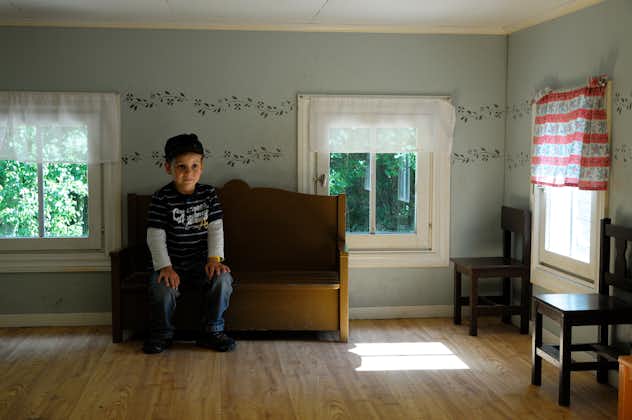 Photo of a little boy inside the Astrid Lindgren's World, Sweden.