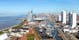 Photo of aerial view of the city of Bremerhaven with the harbor and traditional sailing-ships, Germany.