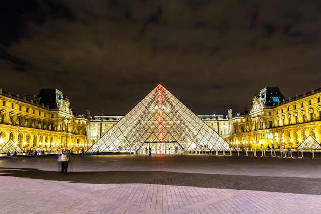 Photo of The Louvre Pyramid at night, Paris, France.