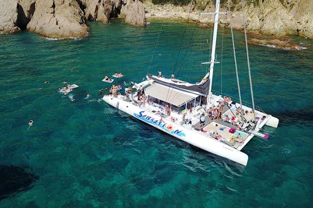 Sailing along the Costa Brava in a big Catamarán with buffet-barbacue and bathing inlet. Drinks included.