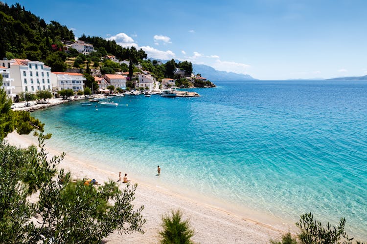 Photo of beautiful Adriatic Beach and Lagoon with Turquoise Water near Split, Croatia.